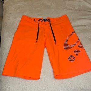 Orange Oakley board shorts/Swim Trunks